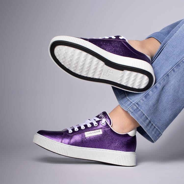 A pair of purple shoes joined with polyurethane adhesives