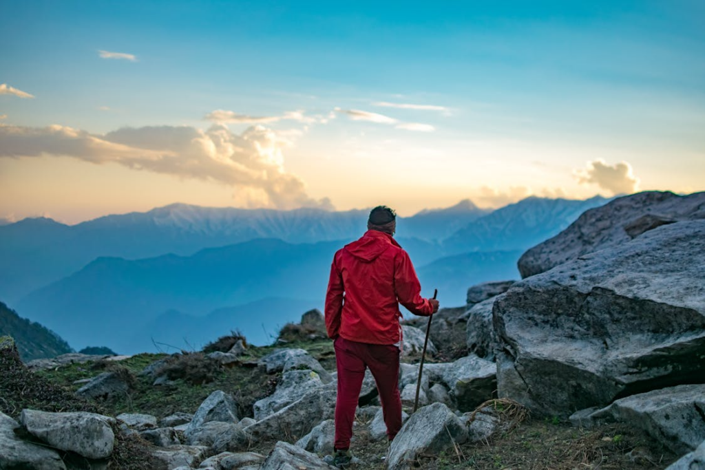 A person hiking in a protective jacket
