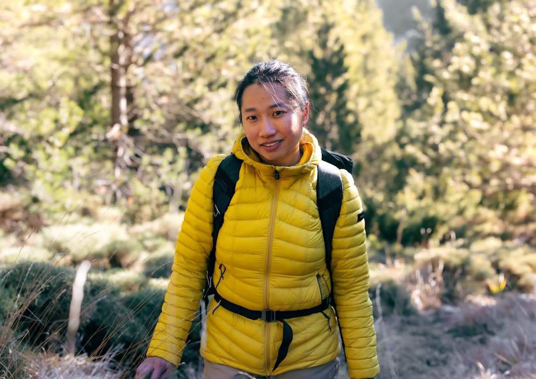 woman hiking in a protective jacket
