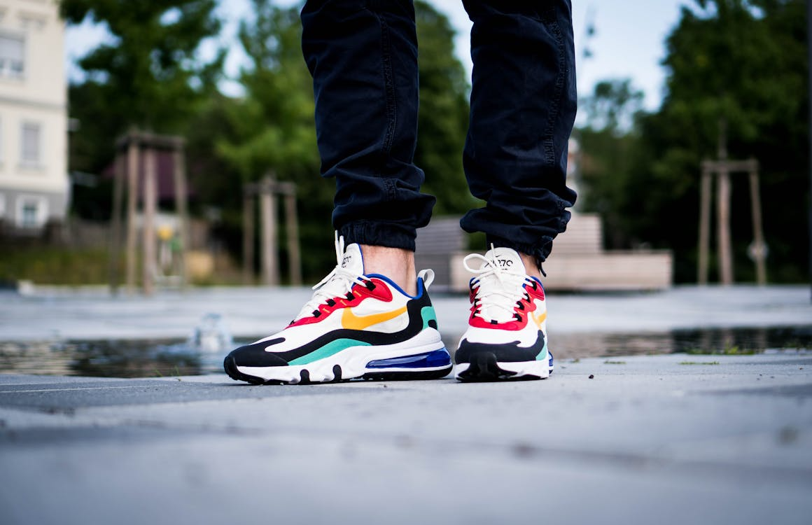 A person wearing trainers