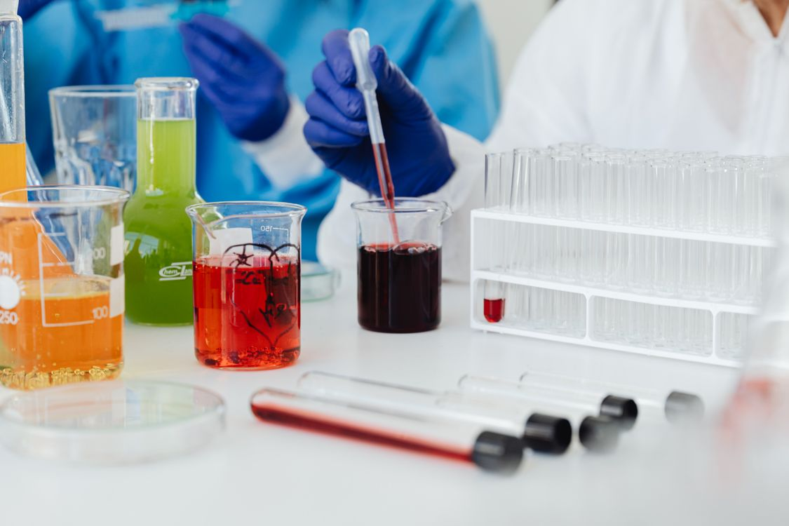 Test tubes and containers with liquids