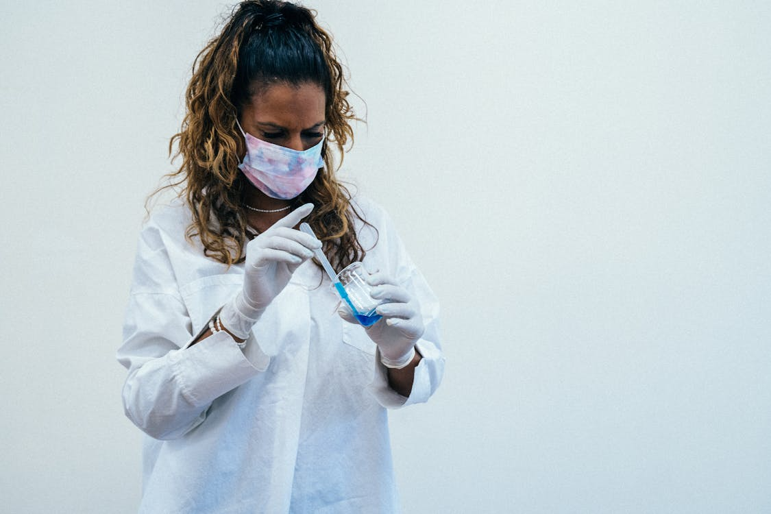 a scientist working with chemicals